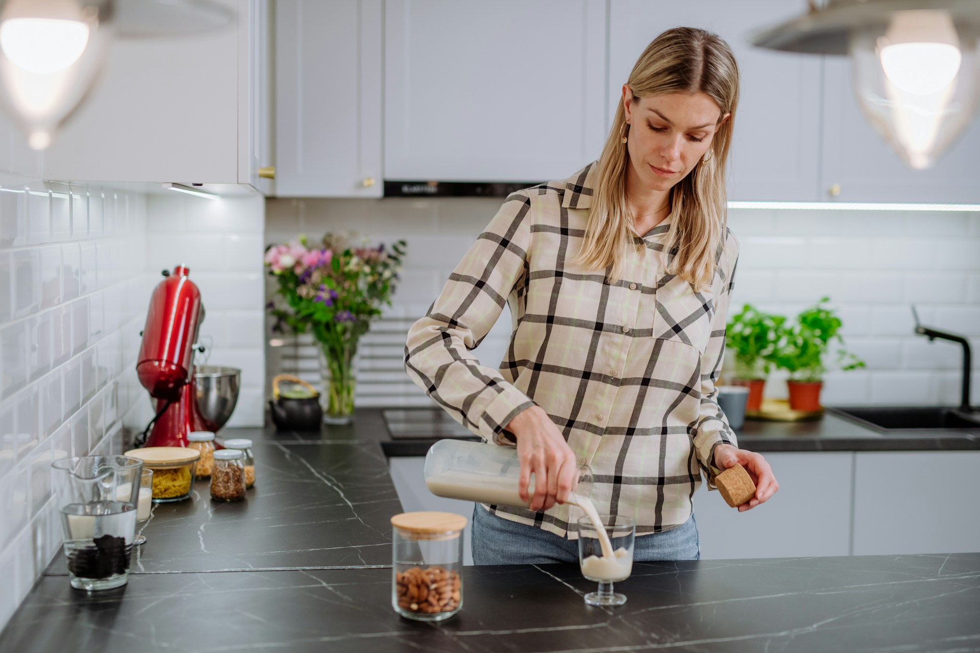 Woman Pouring Alternative Milk